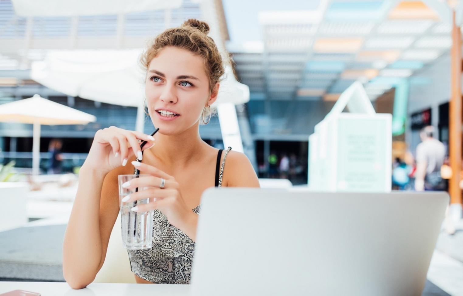Students collaborating on cybersecurity projects in a modern learning environment
